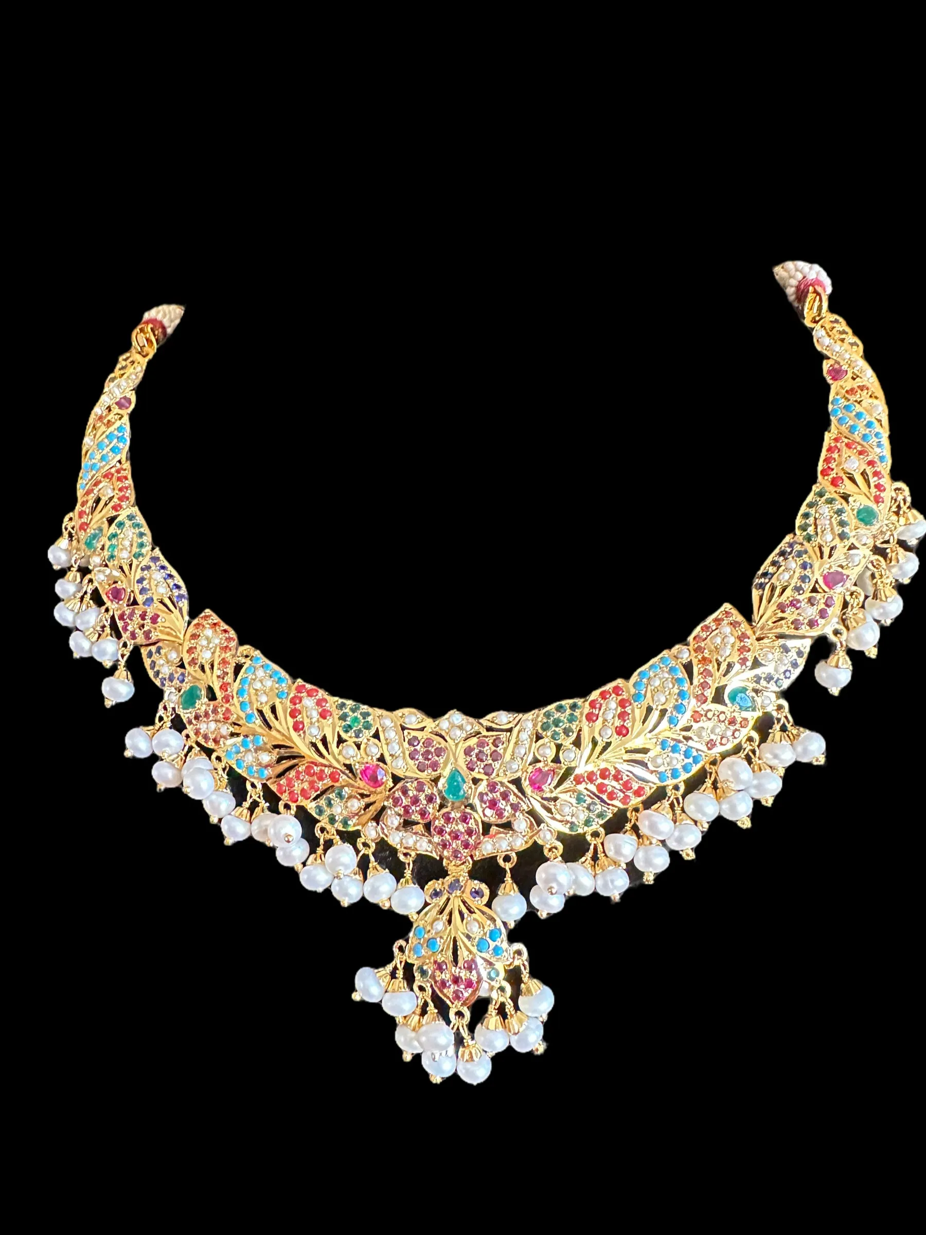 Navratan necklace  set with fresh water pearls in gold plated silver